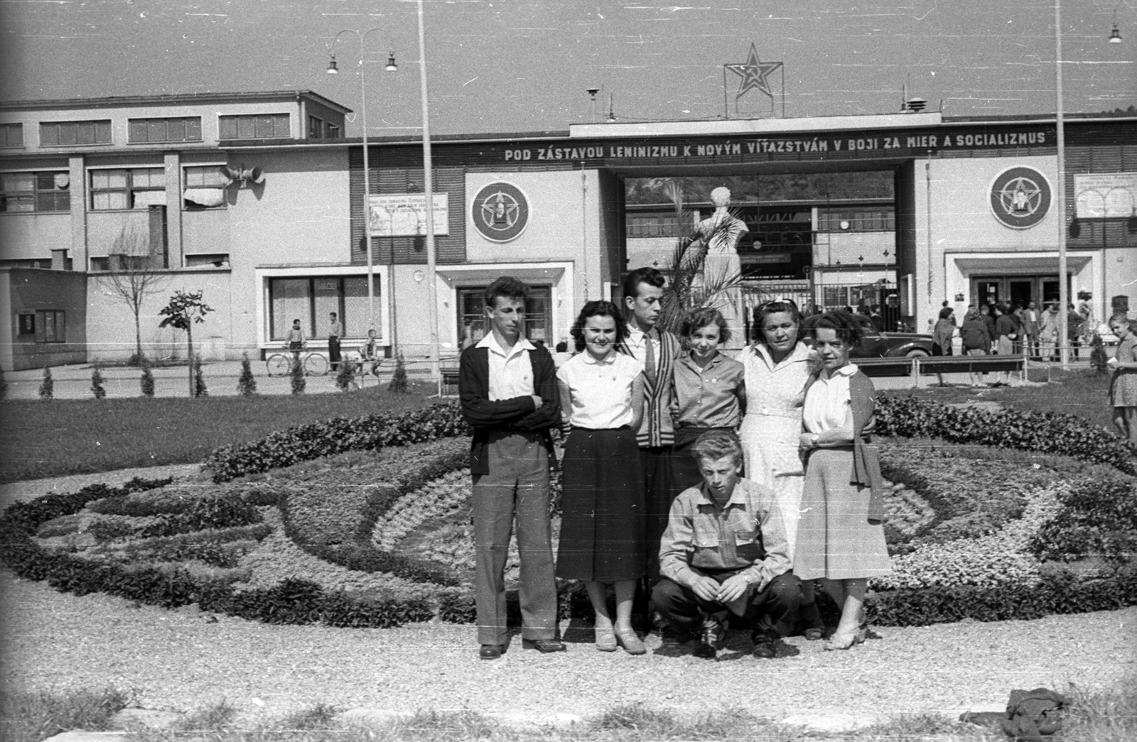 Slovakia, Púchov, a Makyta ruhagyár bejárata., 1956, Dobóczi Zsolt, Czechoslovakia, political decoration, Red Star, slogan, megaphone, clothing factory, Antonín Zápotocký-portrayal, Viliam Široký-portrayal, Fortepan #100761