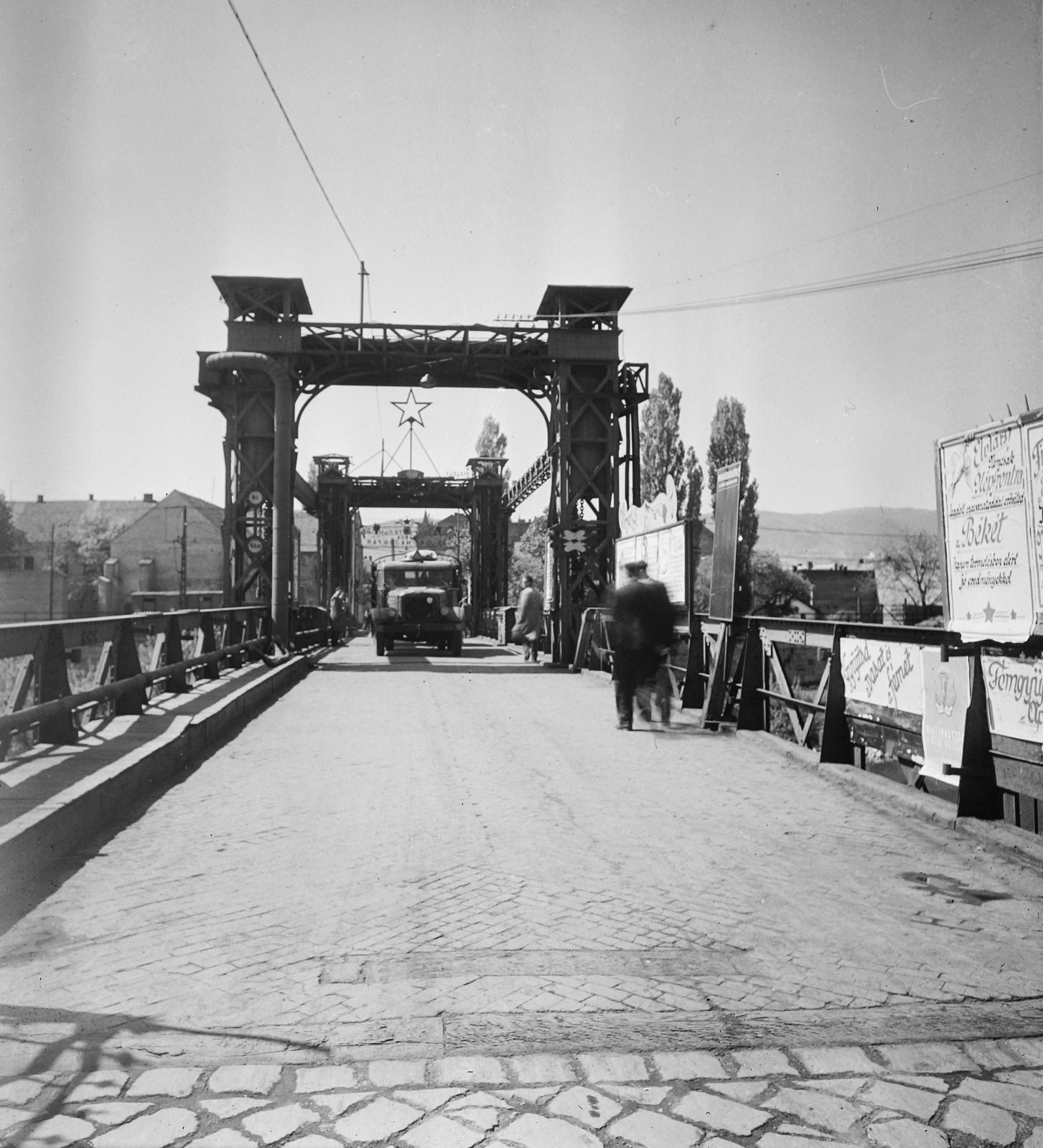 Hungary, Óbuda, Budapest III., a Duna-ág felett a Hajógyári-szigetre vezető emelőhíd., 1953, UVATERV, bridge, poster, commercial vehicle, Csepel-brand, political decoration, slogan, Budapest, Fortepan #12030