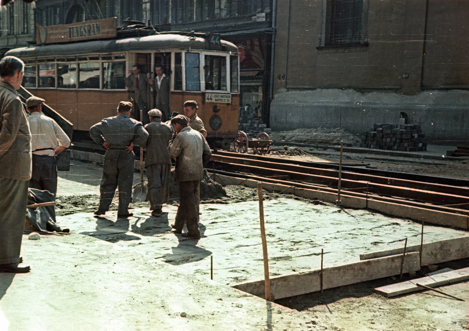 Hungary, Budapest V., Kossuth Lajos utca, a villamos mögött az 1. szám, jobbra a Belvárosi Ferences templom látszik., 1955, Horváth Miklós dr, colorful, construction, tram, Tungsram-brand, Budapest, Fortepan #129427