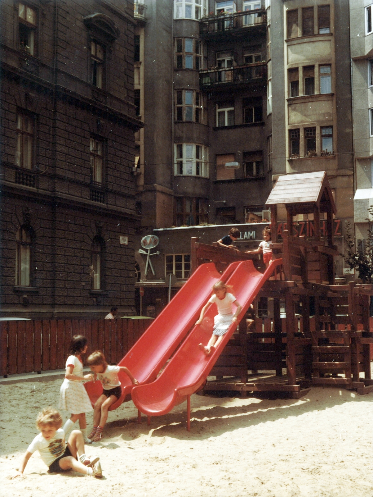 Hungary, Budapest VI., Jókai tér, balra a Mozsár utca., 1980, Hlatky Katalin-Főkert, playground slide, wooden structure, Budapest, Fortepan #141299