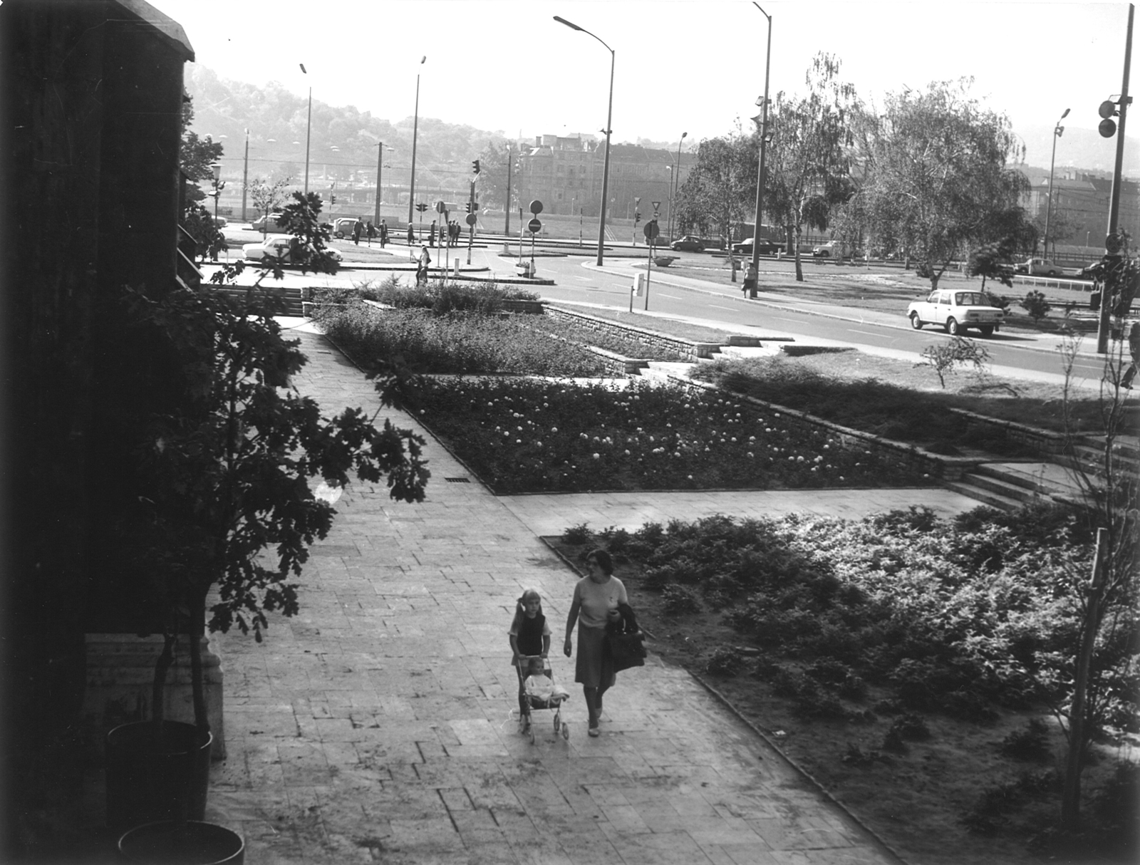 Hungary, Budapest V., Március 15. tér, balra a Belvárosi templom., 1975, Hlatky Katalin-Főkert, Budapest, baby carriage, flower bed, Fortepan #141360