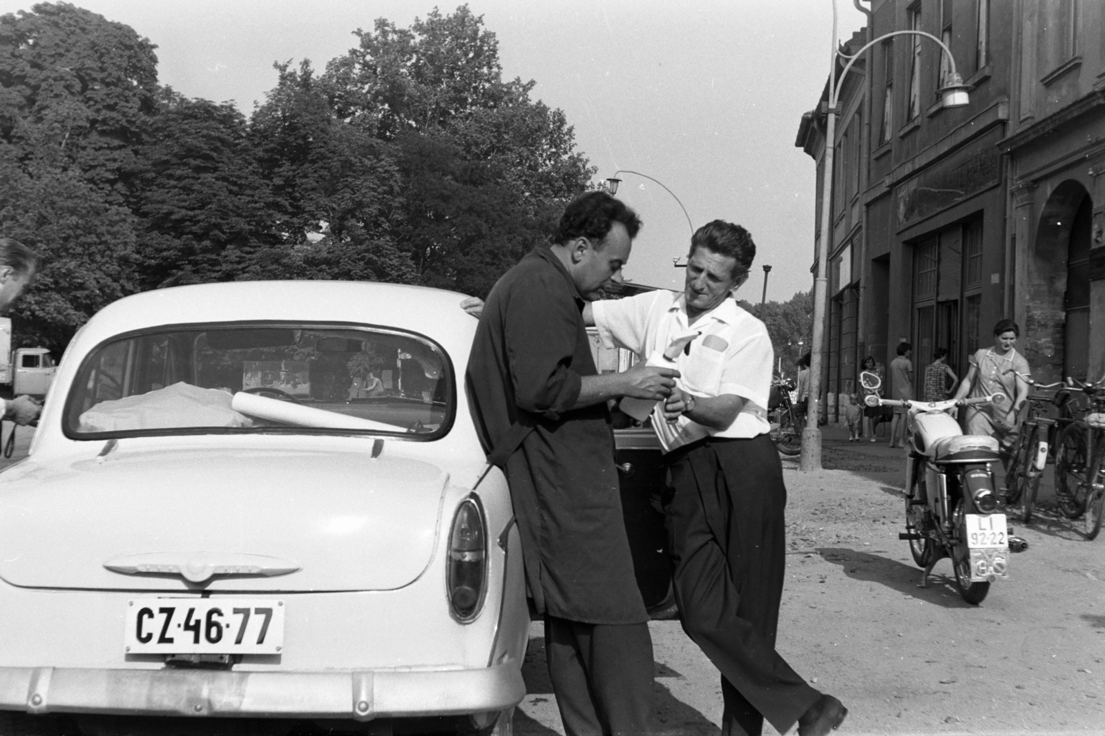 Hungary, Kapuvár, Fő tér., 1966, Chuckyeager tumblr, bicycle, motorcycle, street view, genre painting, Moskvitch-brand, number plate, Fortepan #143284