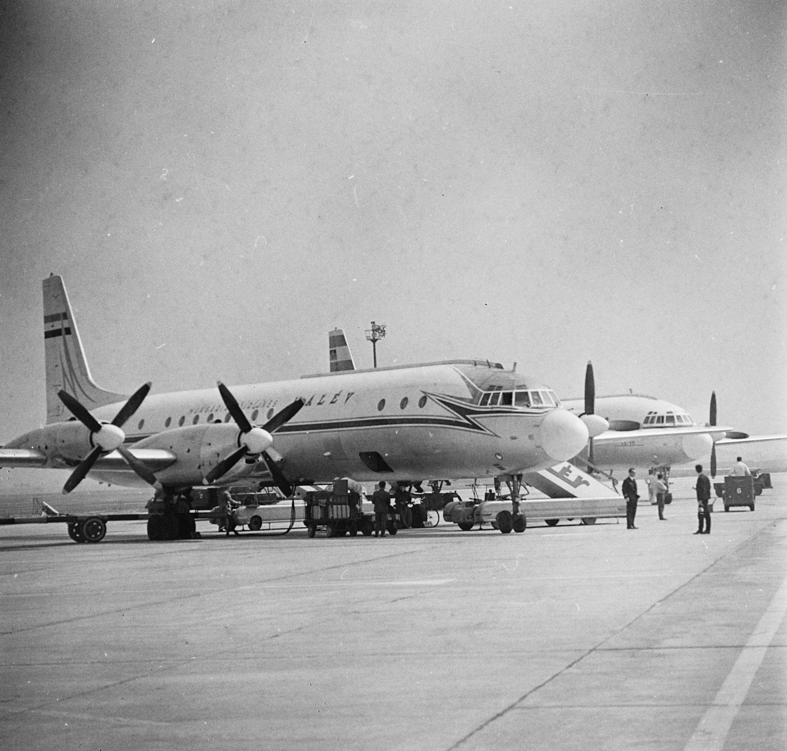 Hungary, Ferihegy (now - Ferenc Liszt) International Airport, Budapest XVIII., MALÉV IL-18 repülőgép., 1966, MHSZ, transport, Soviet brand, airplane, airport, Ilyushin-brand, Hungarian Airlines, propeller, Budapest, aircraft steps, Fortepan #15371