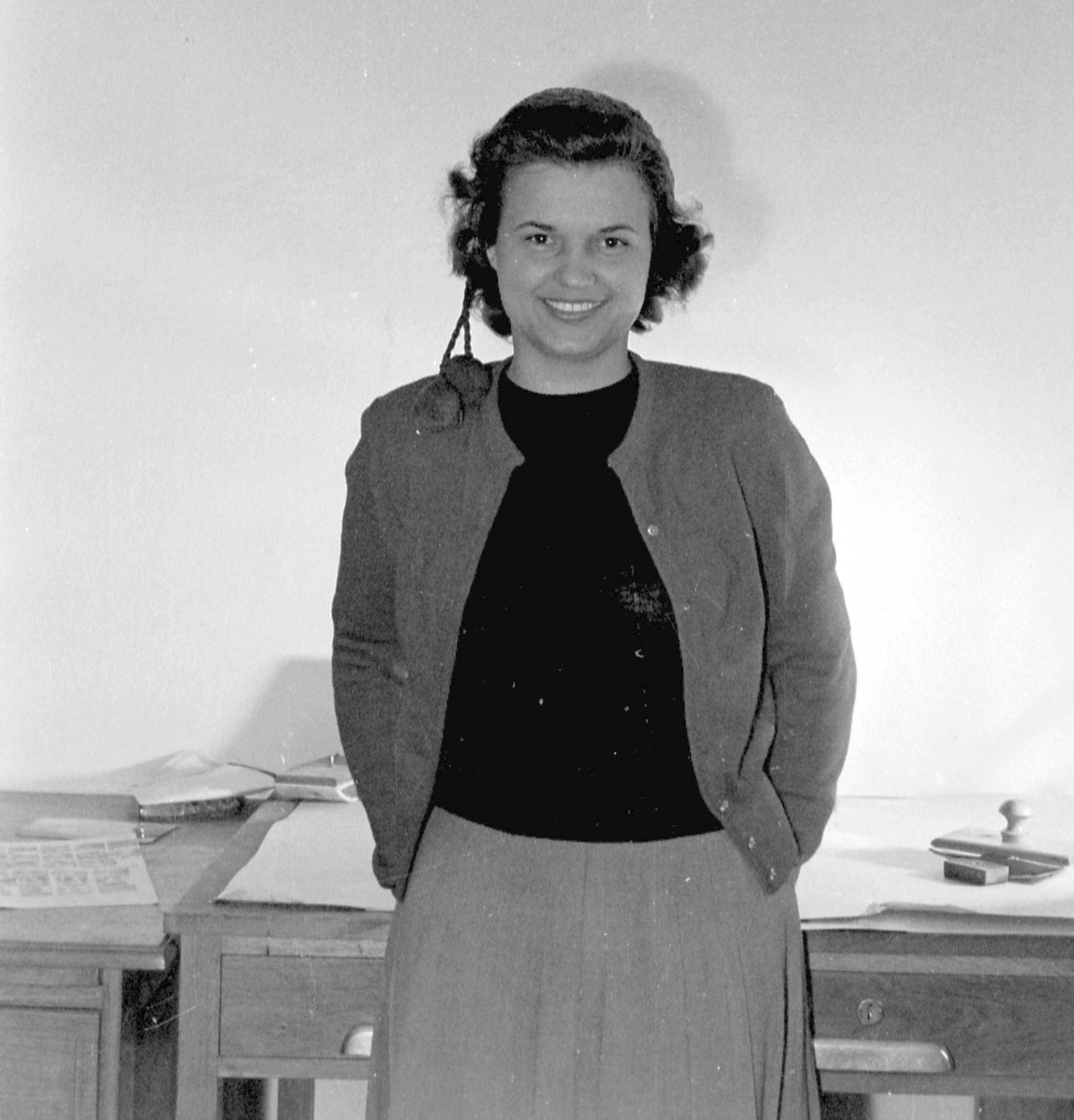 Hungary, 1952, Magyar Rendőr, portrait, office, desk, interior, lady, skirt, blotter, cardigan, hands behind the back, Fortepan #16747