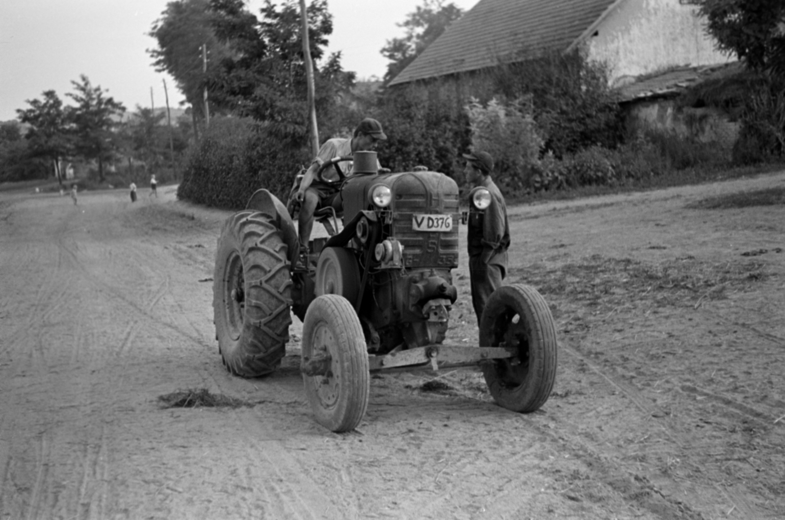 1955, Sattler Katalin, H.S.C.S-brand, number plate, talks, tractor, dirt road, Fortepan #171126