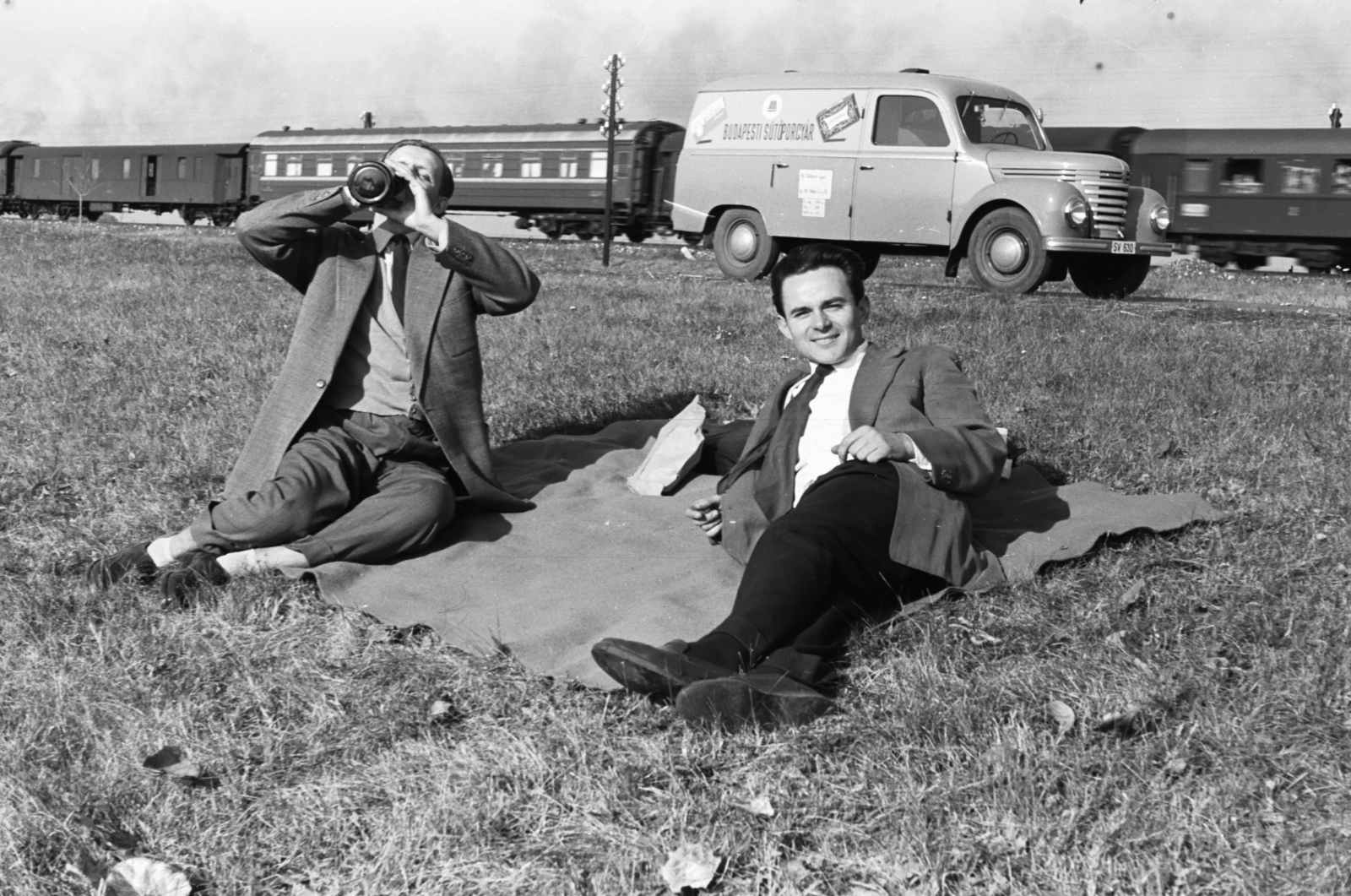Hungary, 1957, Chuckyeager tumblr, railway, aerial wire, coach, relaxation, suit, tie, drinking, Fortepan #175691