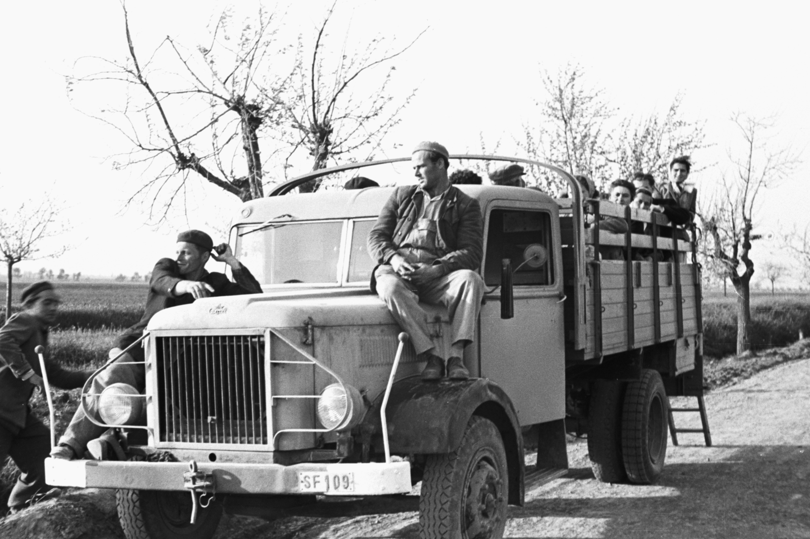 1955, Chuckyeager tumblr, Csepel-brand, number plate, worker, agriculture, sitting on a car, Fortepan #175703