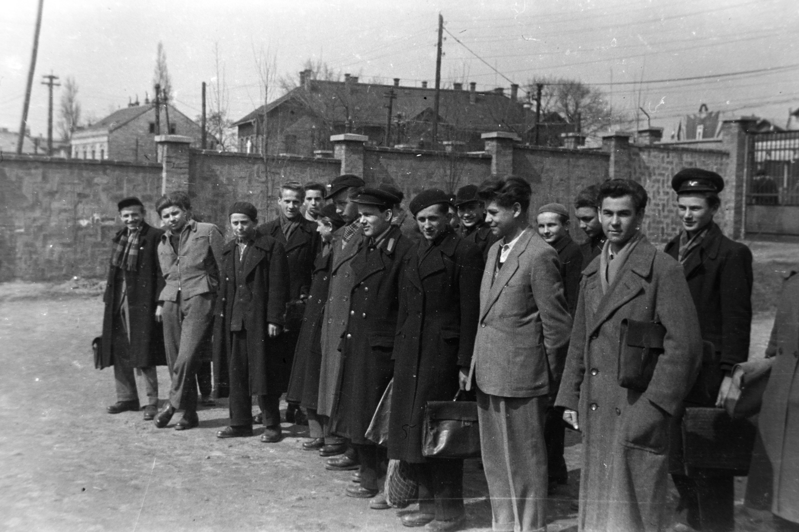 1950, Fortepan/Album038, men, coat, waiting, brick fence, briefcase, cap, Fortepan #186838