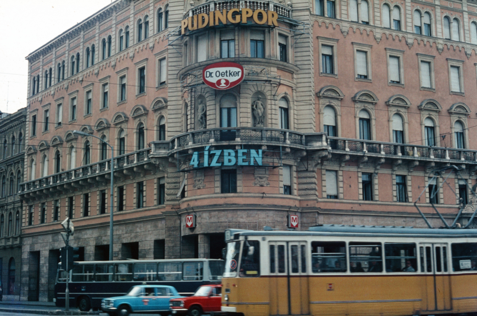 Hungary, Budapest VIII., Rákóczi út - József körút sarok a Nagykörúti kereszteződésből nézve., 1982, Fortepan/Album040, ad, colorful, bus, taxicab, Ikarus-brand, tram, Ganz-brand, subway station, Budapest, Dr. Oetker-brand, Fortepan #188457