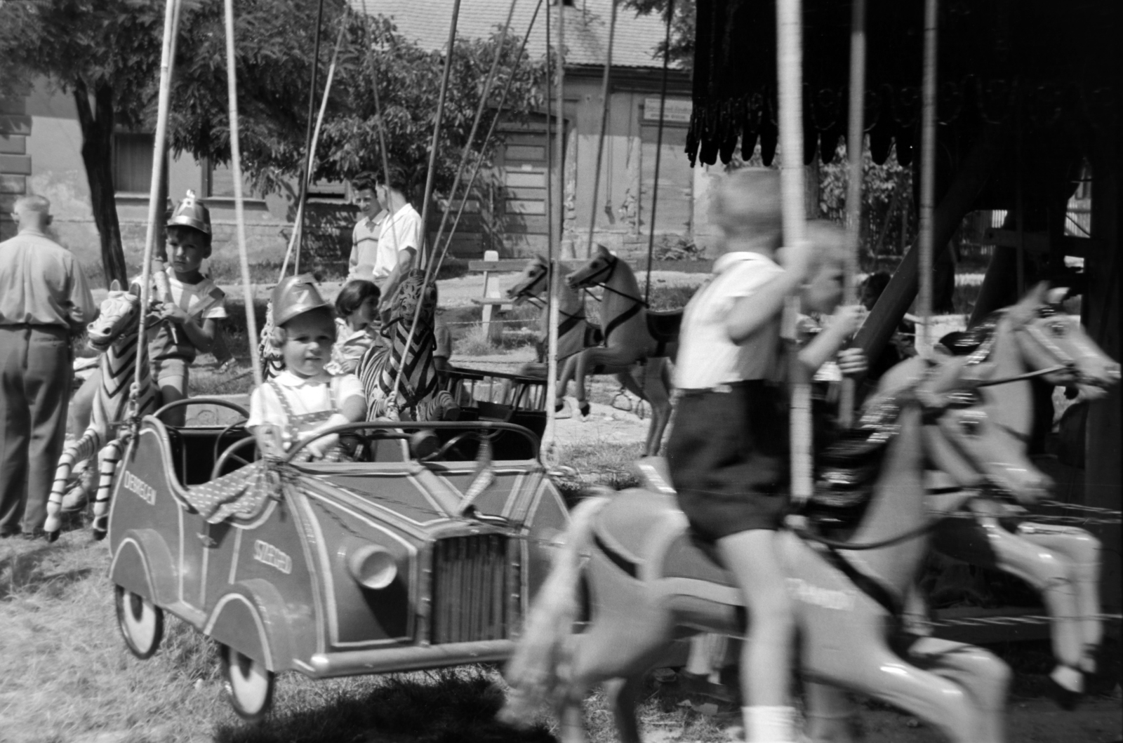 Hungary, Budakeszi, a felvétel egy búcsúban készült., 1959, Martin Kornél, carousel, pedal car, hobby horse, Fortepan #196953