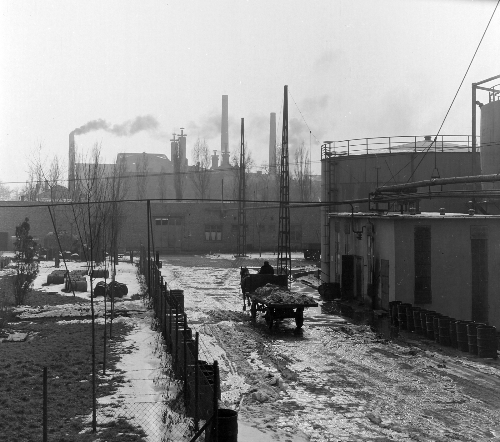 Hungary, Budapest X., Maglódi út 6., Növényolaj és Szappangyár., 1958, Keveházi János, Budapest, Horse-drawn carriage, photo aspect ratio: square, fence, wood, snow, winter, factory, factory chimney, pipeline, Fortepan #197604