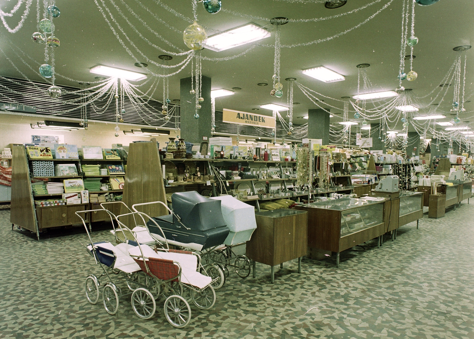 Hungary, Budapest VIII., Blaha Lujza tér, Corvin Áruház., 1970, FŐFOTÓ, baby carriage, shop interior, Budapest, colorful, Christmas, decoration, Fortepan #214558