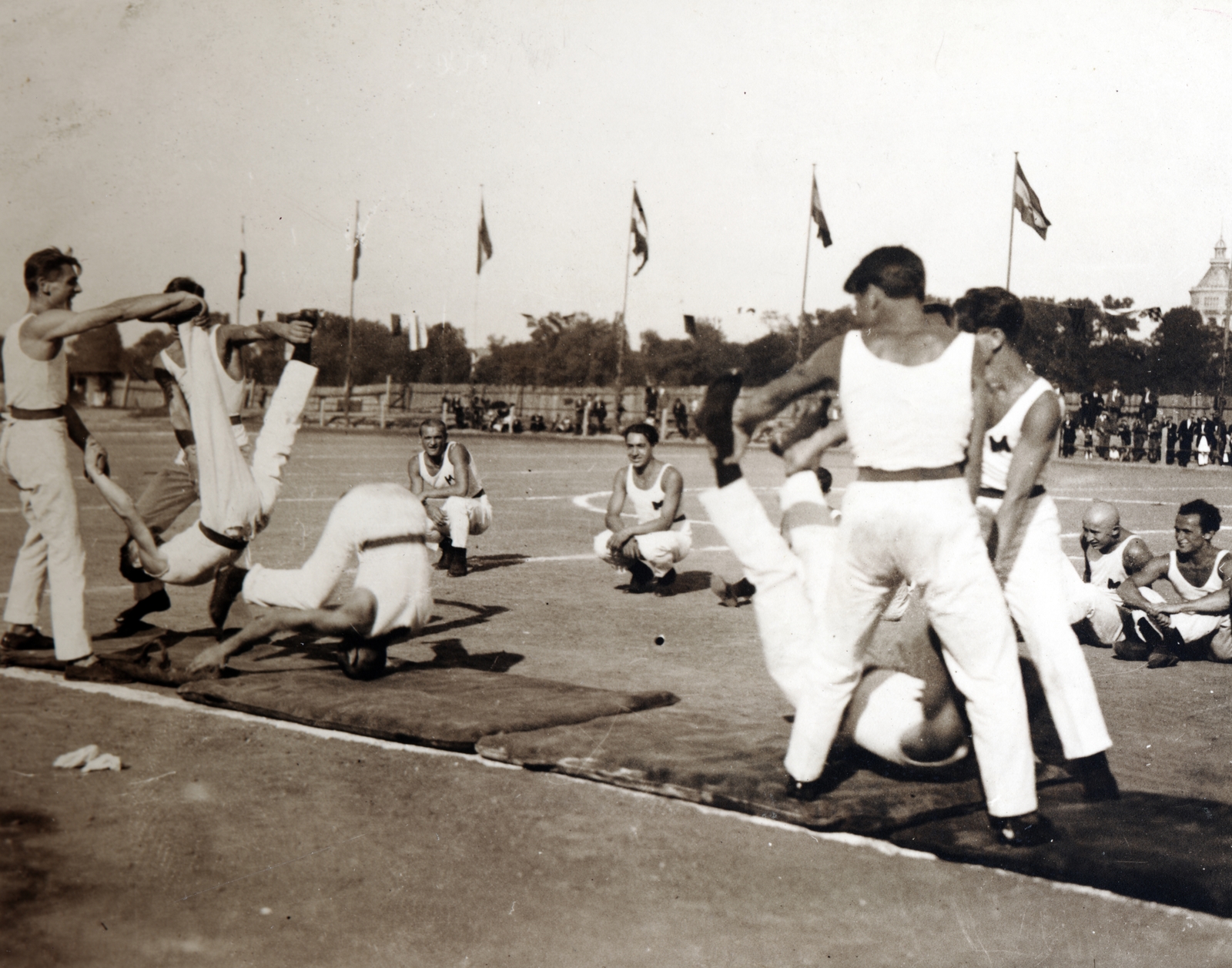 Hungary, Budapest XIII., Újpesti rakpart, tornabemutató a B.T.K. sportpályáján. Jobb szélen a Margitszigeti Víztorony látható., 1928, Hirsch Hugó, feat, Budapest, Fortepan #229362