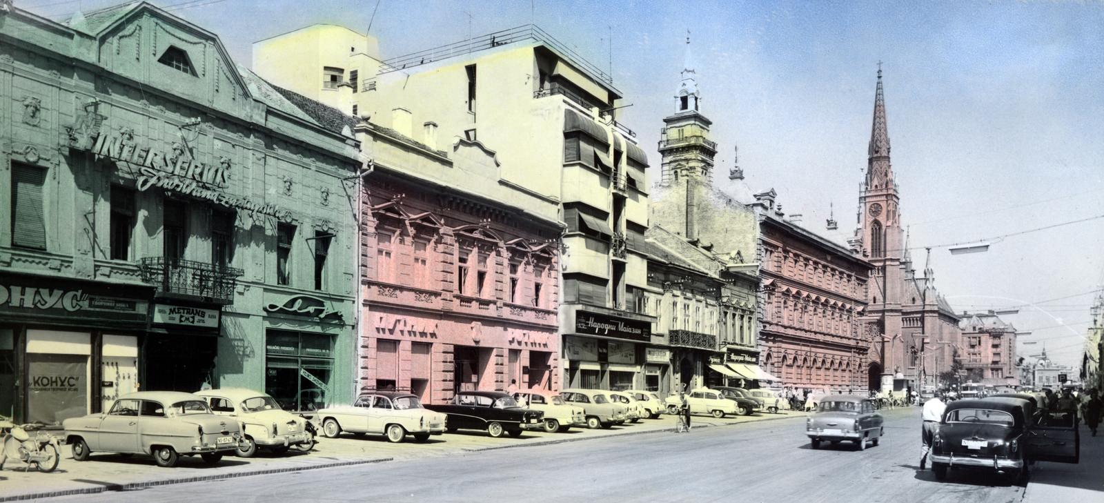 Serbia, Novi Sad, ulica Kralja Aleksandra, távolabb a Trg Slobode és a Szűz Mária Szent Neve-templom (Crkva imena Marijinog), 1963, Rajz Helga Eszter, Fortepan #233892