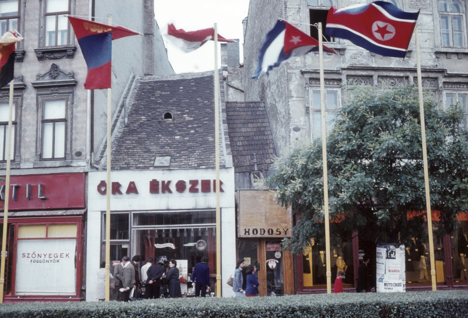 Hungary, Sopron, Várkerület (Lenin körút), szemben az 56-60 számú ház., 1974, Majercsik Tamás, colorful, flag, clockmaker, home textile store, Fortepan #24039