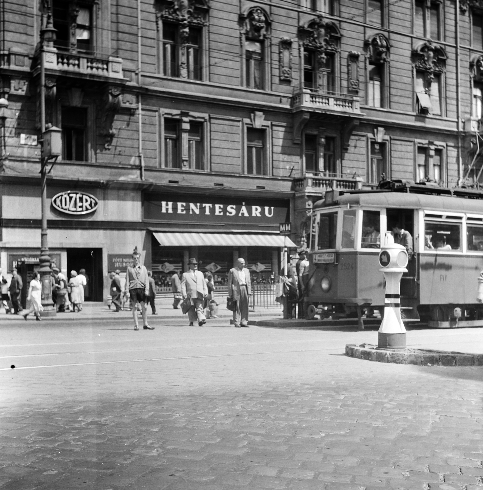 Hungary, Budapest XIII., Szent István körút villamosmegálló 2-es számú ház előtt, a Jászai Mari tér közelében., 1957, Ungváry Rudolf, tram, Budapest, butcher, grocery store, Közért Company, photo aspect ratio: square, csibi lamp, Fortepan #254869