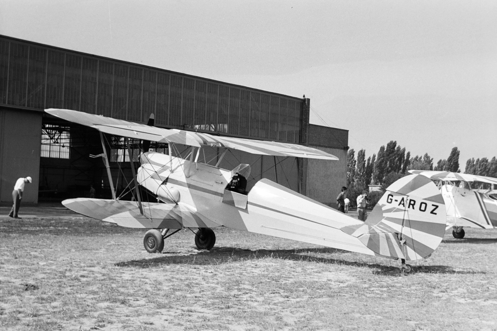 Hungary, Budaörs Airport, Budapest XI., a II. Motoros Műrepülő Világbajnokságon résztvevő egyik repülőgép., 1962, Közösségi Szociális Szövetkezet, airplane, SNCAN Stampe SV.4C, biplane, SNCAN-brand, hangar, Budapest, Fortepan #256511