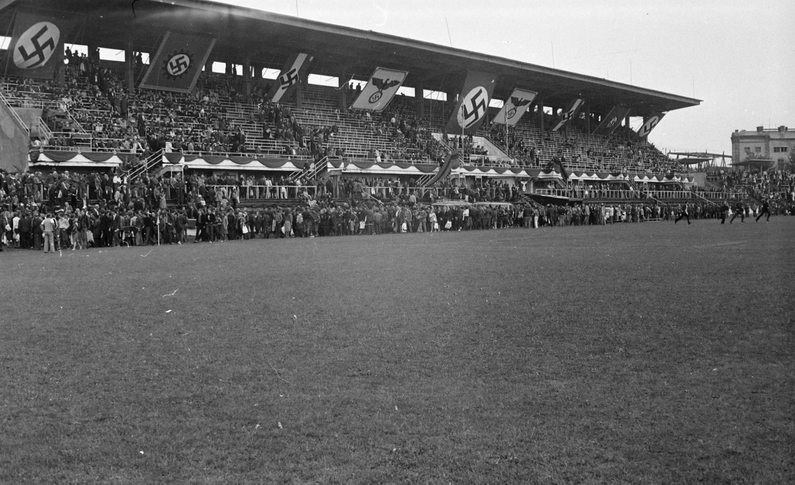 Hungary, Budapest VIII., MTK pálya a "Menekülés a győzelembe" című film forgatásakor., 1980, Tóth Katalin, Budapest, audience, swastica, soccer field, filming, Fortepan #256701