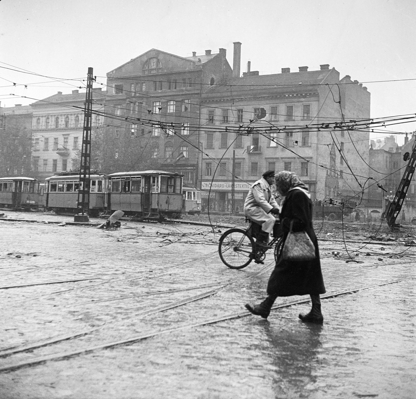 Hungary, Budapest V., Kálvin tér., 1956, Peter, Isaac, bicycle, Budapest, revolution, firewall, wreck, catenary wire, photo aspect ratio: square, tram, haberdashery, Fortepan #256860