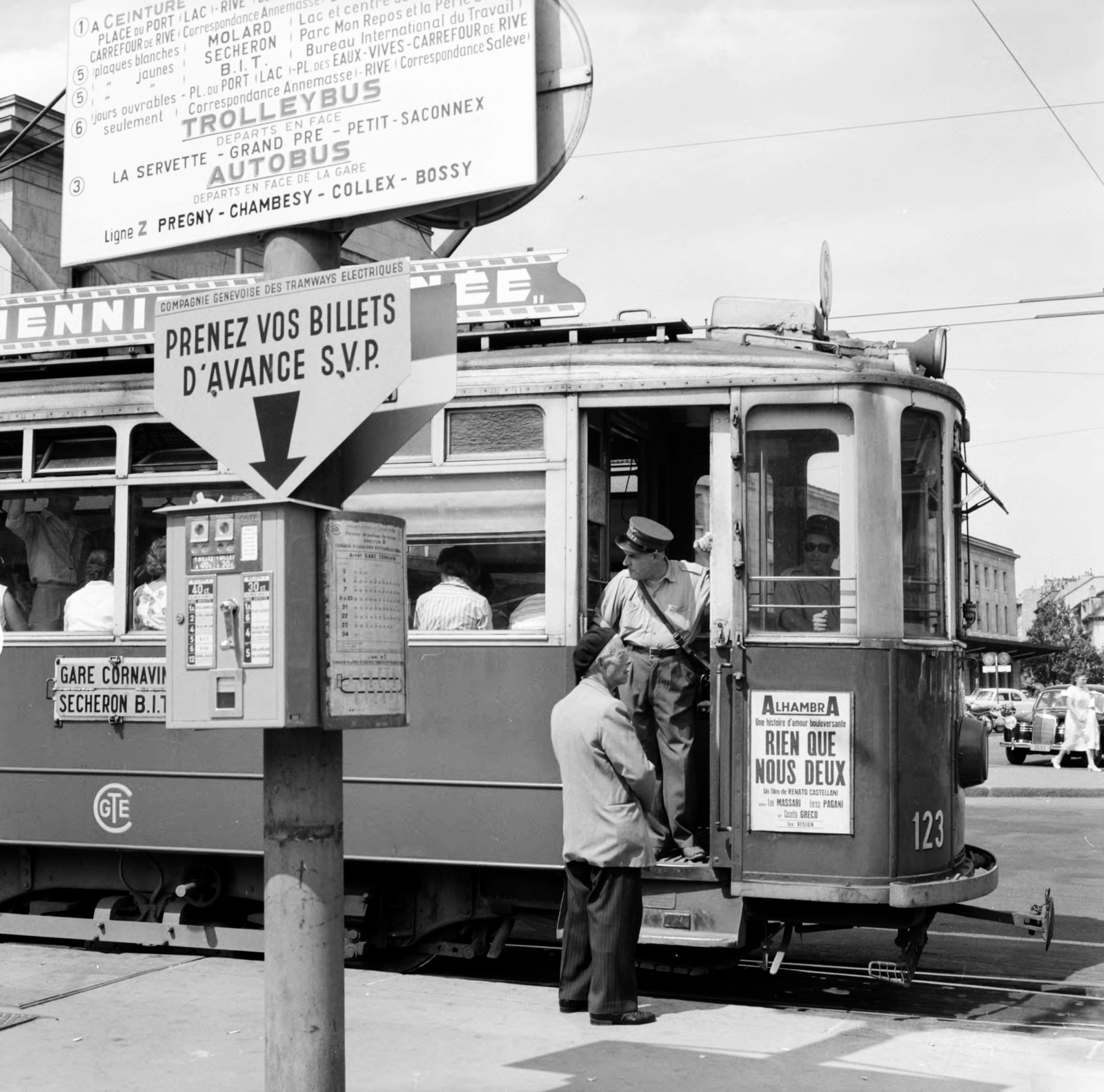 Switzerland, Geneva, Place de Cornavin, háttérben a Gare de Genève-Cornavin a város főpályaudvara., 1958, UWM Libraries, Best of, photo aspect ratio: square, french sign, tram, conductor, destination sign, Fortepan #259229