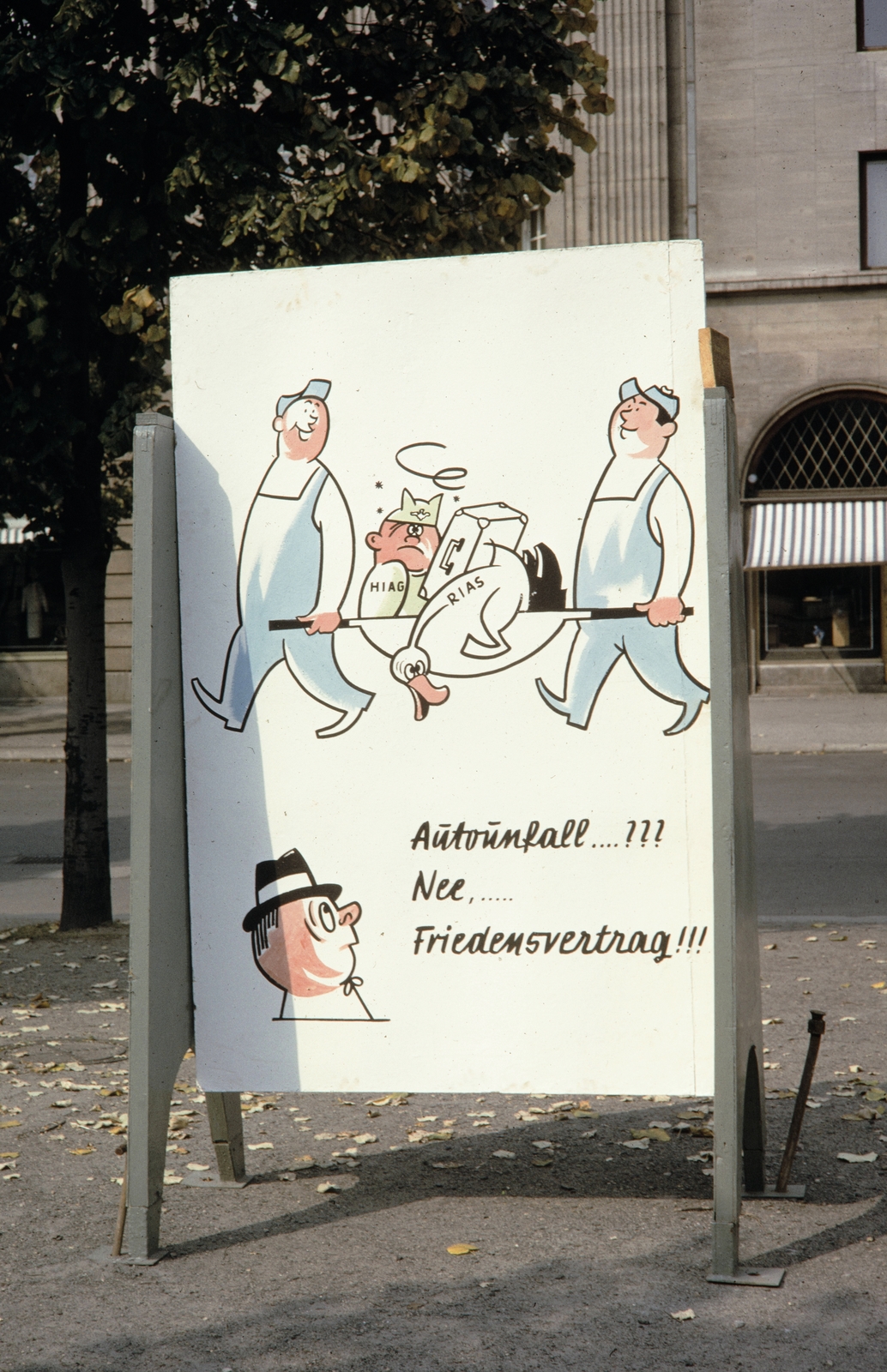 Germany, Berlin, Kelet-Berlin, propagandaplakát az Unter den Linden 24., a Svájci-ház (Haus der Schweiz) előtt., 1961, UWM Libraries, East-Berlin, GDR, german text, caricature, poster, Fortepan #259392