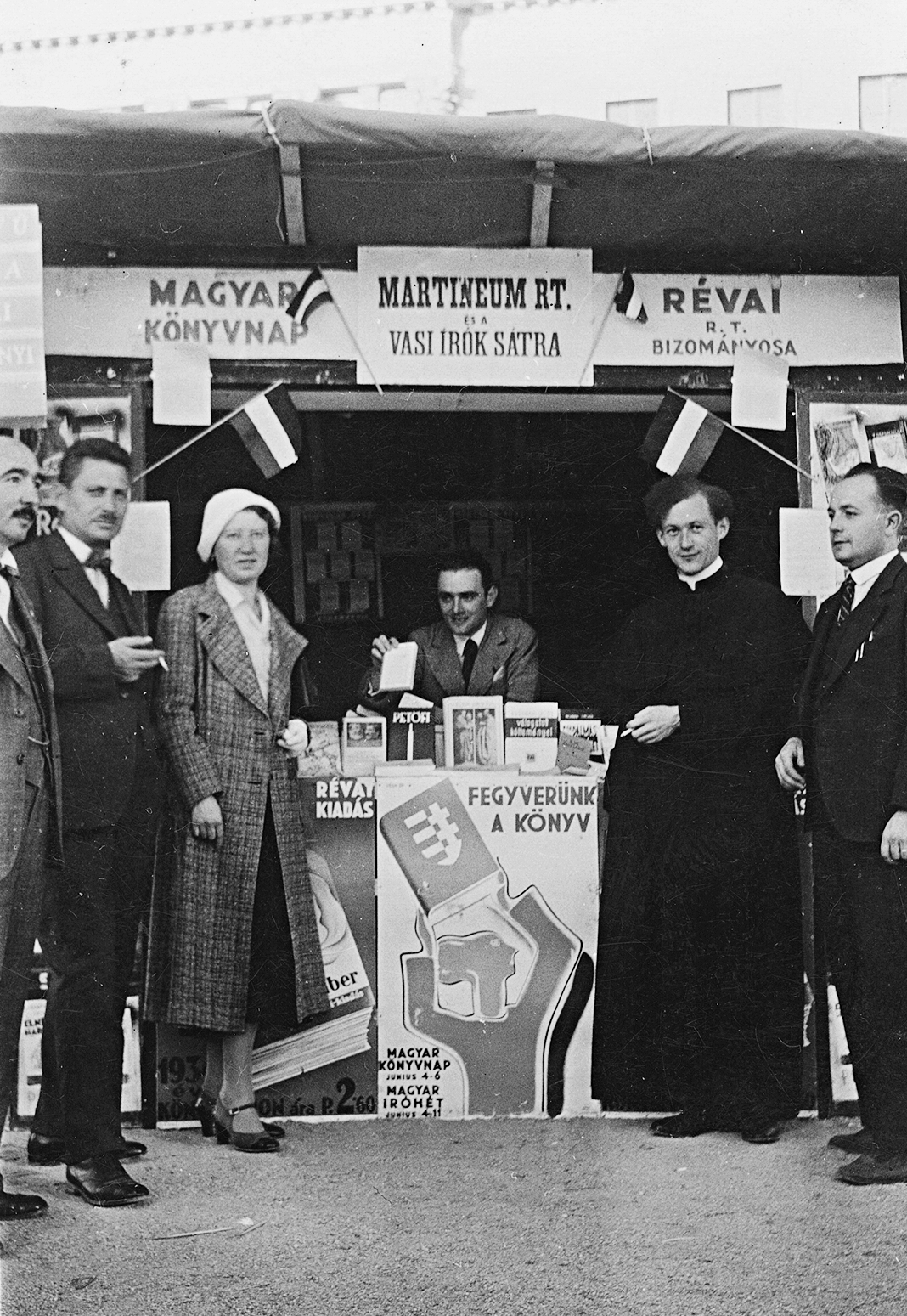 Hungary, Dombóvár, Magyar Könyvnap, Vasi írók könyvsátra., 1934, Erky-Nagy Tibor, poster, flag, priest, crest, Révai publishing house, Fortepan #26494