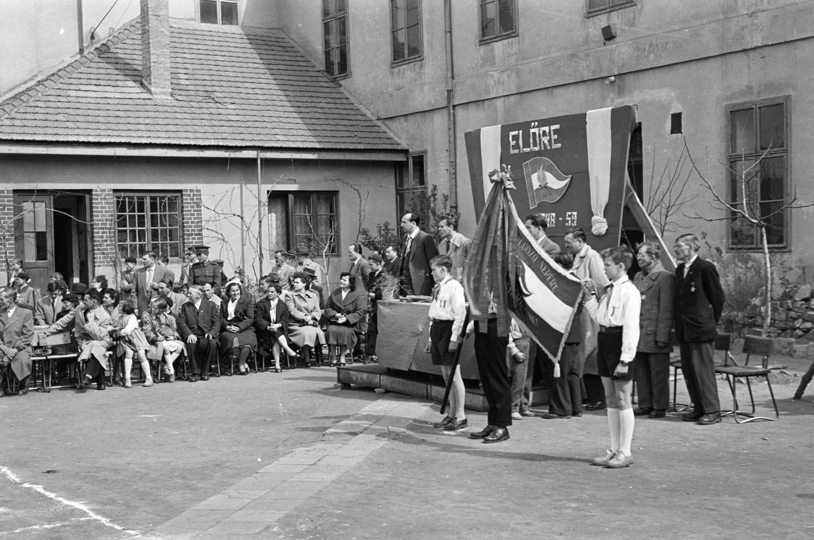 Hungary, Csorna, Árpád utca, ünnepség résztvevői az általános iskola udvarán (később Széchenyi István Általános Iskola)., 1959, Lipovits Károly, Best of, flag, table, stand, Hungarian soldier, Fortepan #271730