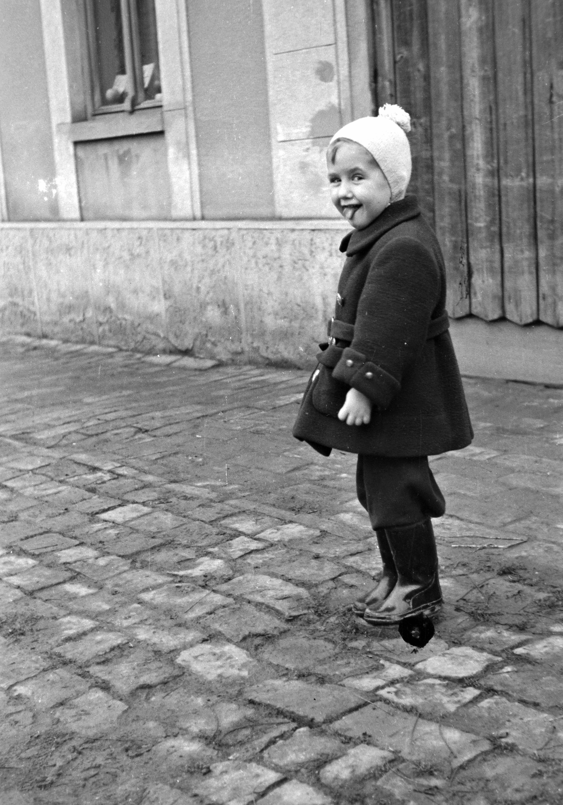 1957, Németh Tamás, sticking tongue out, kid, cap, boots, Fortepan #30220