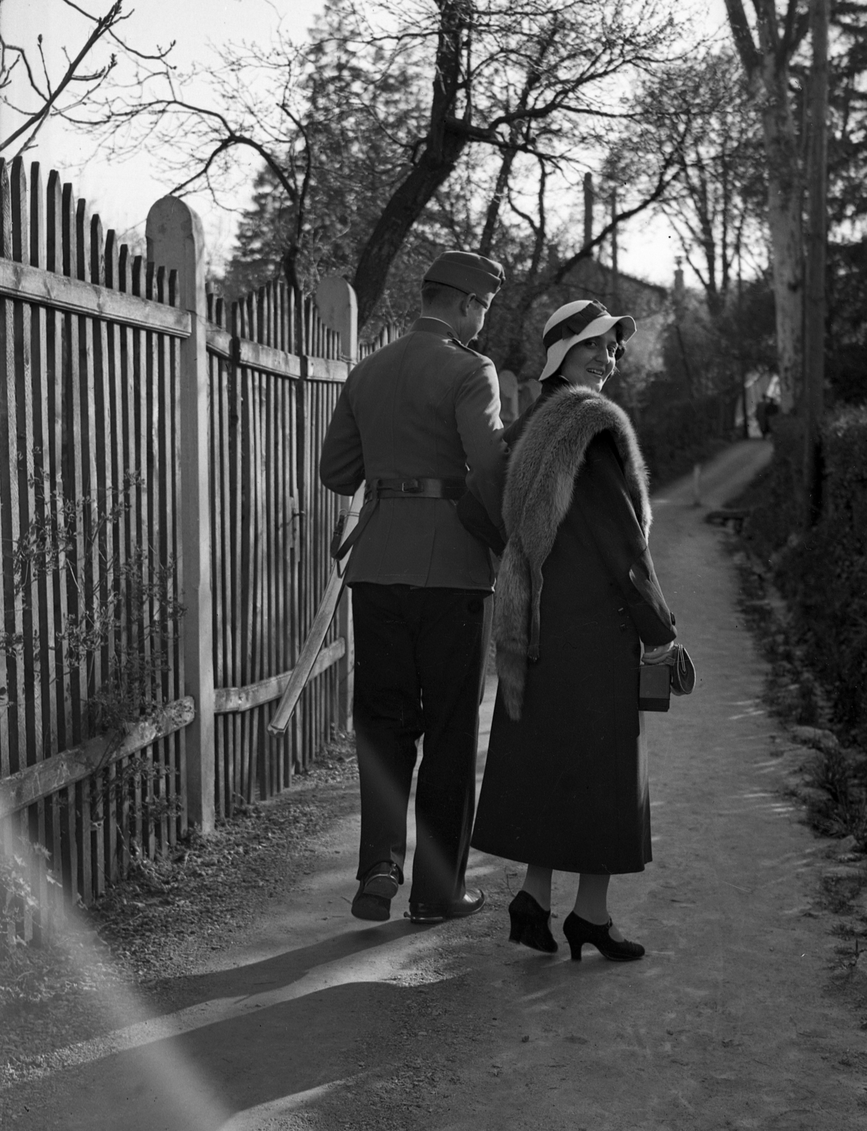 1935, Rados Tamás OSB, hat, uniform, man, fence, woman, sword, fur, looking back, Fortepan #40424