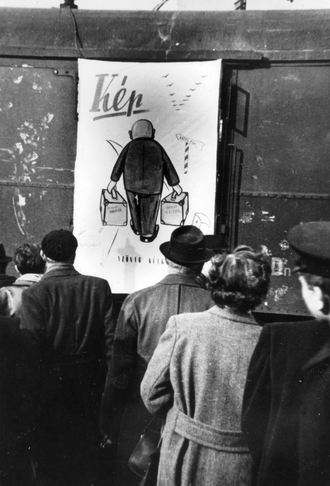 Hungary, Budapest II., Vagonra ragasztott karikatúra a Széna téren., 1956, Pesti Srác2, poster, revolution, pedestrian, curiosity, coach, Budapest, Fortepan #46760