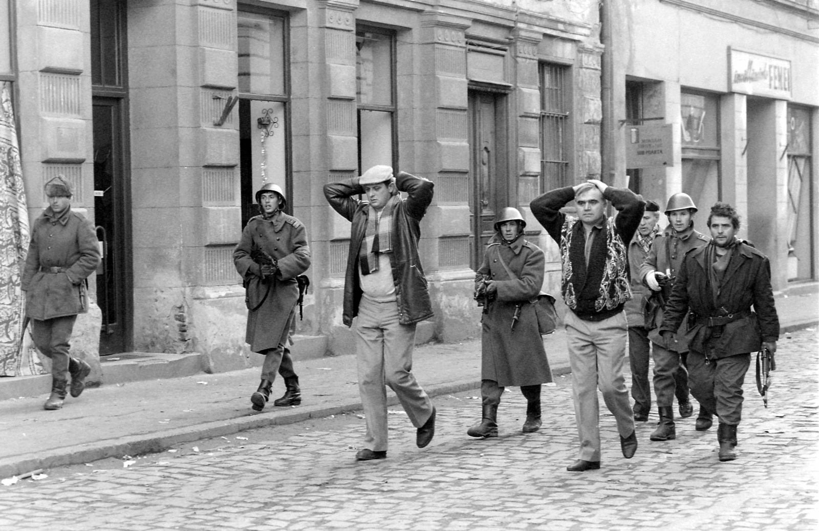 Romania,Transylvania, Timisoara, Strada Alba Iulia. Romániai forradalom., 1989, Urbán Tamás, uniform, revolution, men, street view, Kalashnikov, weapon, helmet, soldier, prisoners, regime change, Romanian revolution, hands behind the head, Fortepan #47049