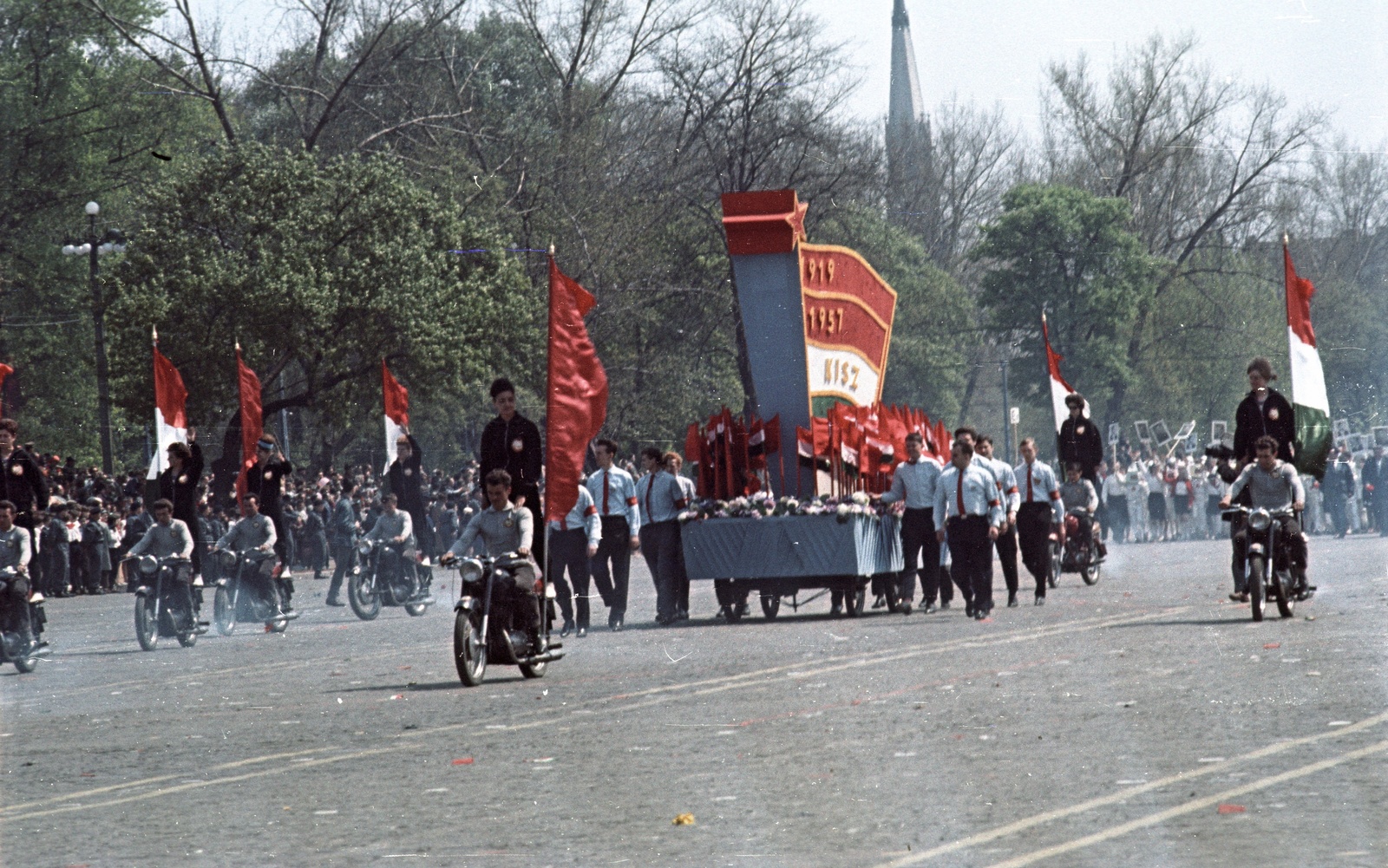 Hungary, Budapest XIV., Ötvenhatosok tere (Felvonulási tér), május 1-i felvonulás., 1964, Nagy Gyula, colorful, flag, motorcycle, political decoration, march, 1st of May parade, Budapest, ad truck, Fortepan #50671