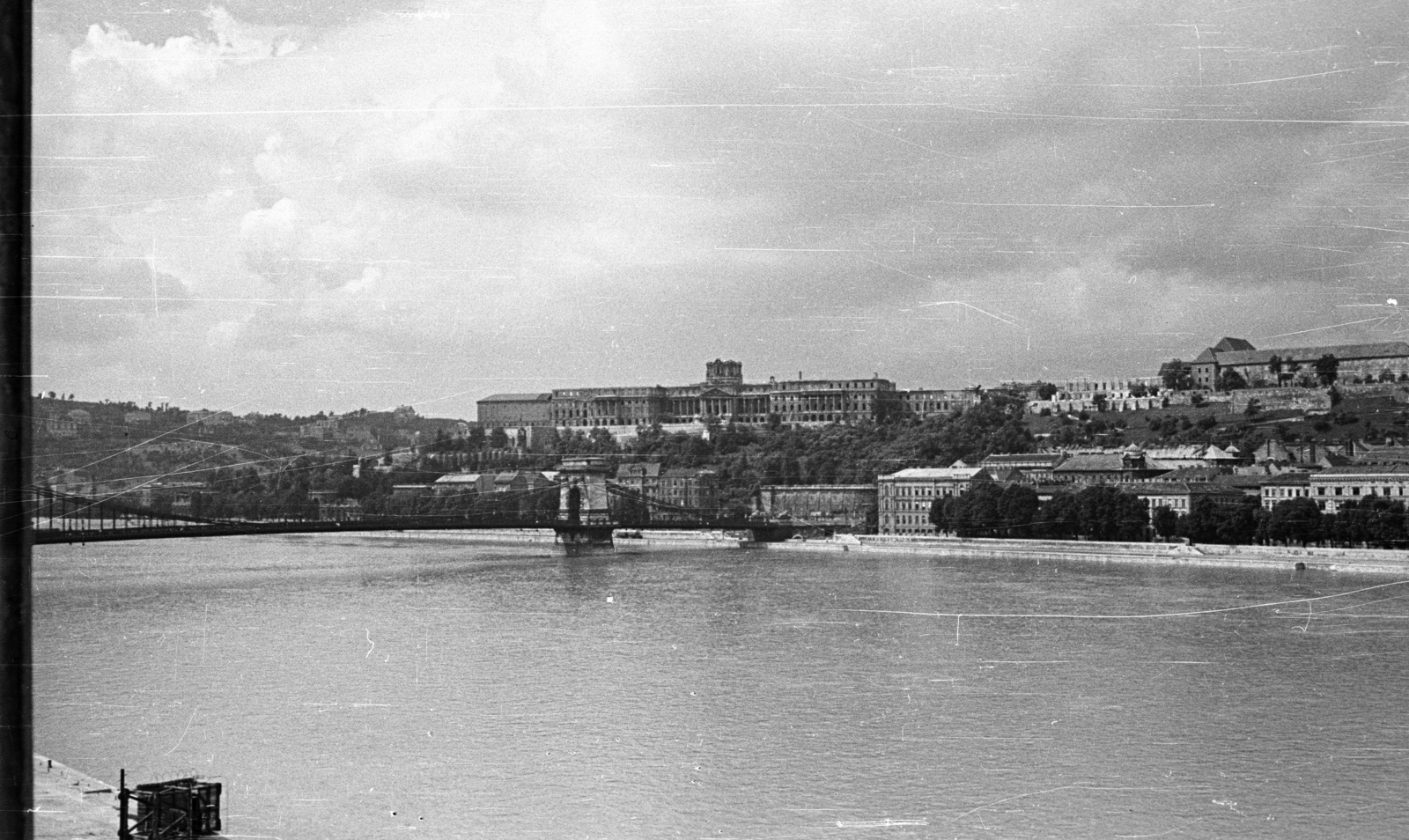 Hungary, Budapest V.,Budapest I., a Széchenyi Lánchíd és a romos Királyi Palota (később Budavári Palota) a Széchenyi rakpart felől nézve., 1957, Nagy Gyula, bridge, war damage, picture, Budapest, suspension bridge, William Tierney Clark-design, Fortepan #51679