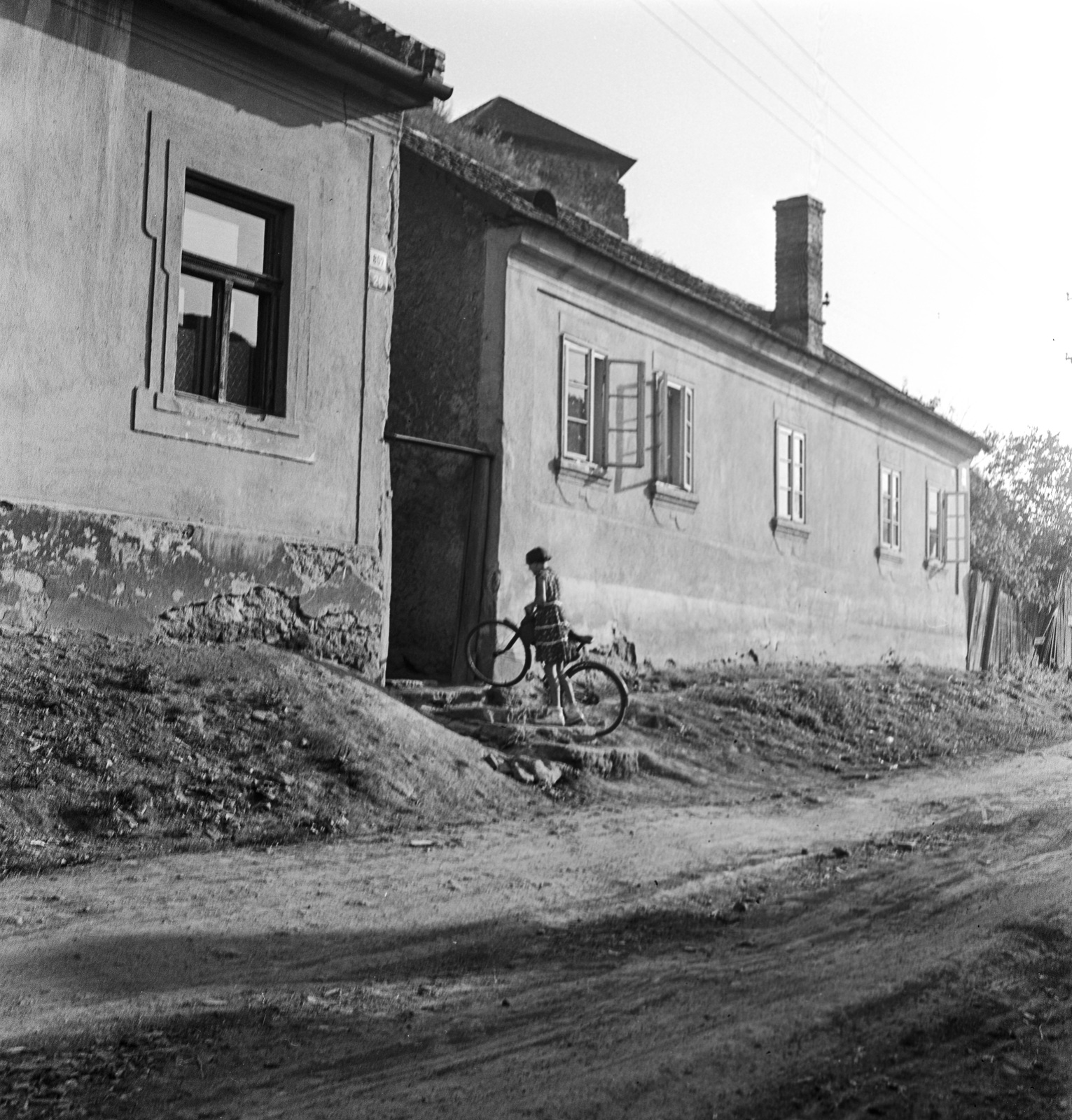 Slovakia, Fiľakovo, ulica Podhradská., 1960, Zsanda Zsolt, Vajszada Károly, Czechoslovakia, bicycle, Fortepan #53980