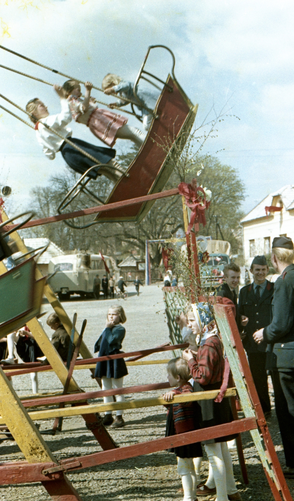 Slovakia, Poltár, Námestie 1. mája., 1958, Zsanda Zsolt, Vajszada Károly, Czechoslovakia, colorful, swing-boat, Fortepan #60219