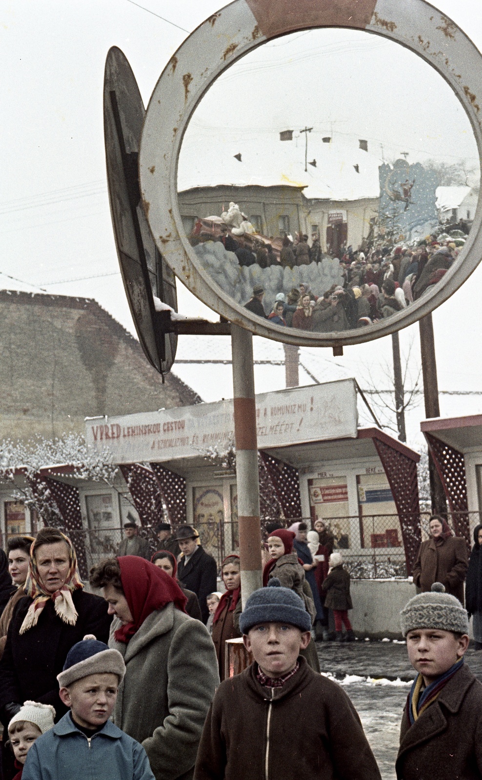 Slovakia, Fiľakovo, ulica Hlavná (Fő utca)., 1961, Zsanda Zsolt, Vajszada Károly, Czechoslovakia, colorful, mirror, political decoration, headscarf, slogan, Fortepan #60271