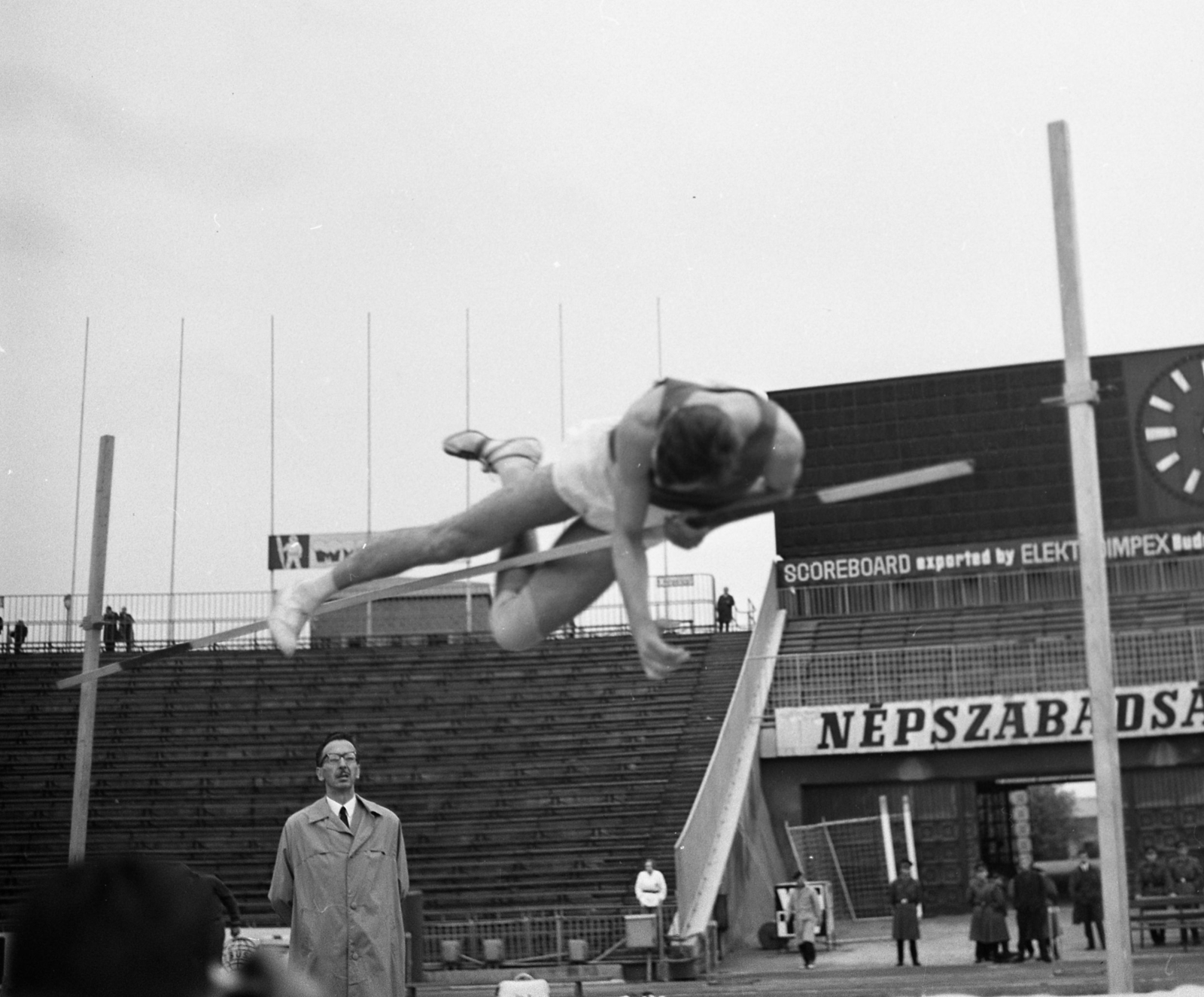Hungary, Népstadion, Budapest XIV., 1968, Magyar Rendőr, label, watch, man, stadium, athletics, high jump, Budapest, Népszabadság newspaper, Fortepan #65678