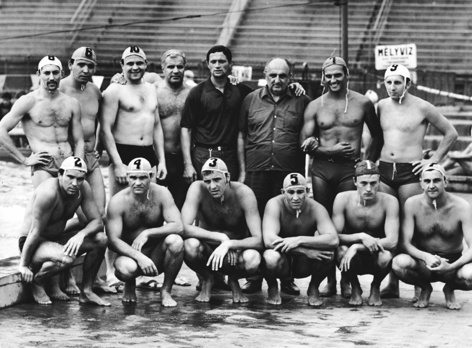 Hungary, Margit Islands, Budapest, Hajós Alfréd Nemzeti Sportuszoda, az OSC bajnokságot nyert vízilabdacsapata. Állnak (balról): Oláh András, Konrád Sándor, Csikós Ferenc, id. Szívós István, ingben Mayer Mihály vezetőedző, Szecsei György szakosztályvezető, Szathmáry Gábor, Elek Miklós. Guggolnak: Bodnár János, Bodnár András, ifj. Szívós István, Konrád Ferenc, Kovács Károly, Gál Jenő., 1970, Fortepan, swimming pool, water polo, muscle, hairy chest, squatting, arms around shoulders, Fortepan #74157