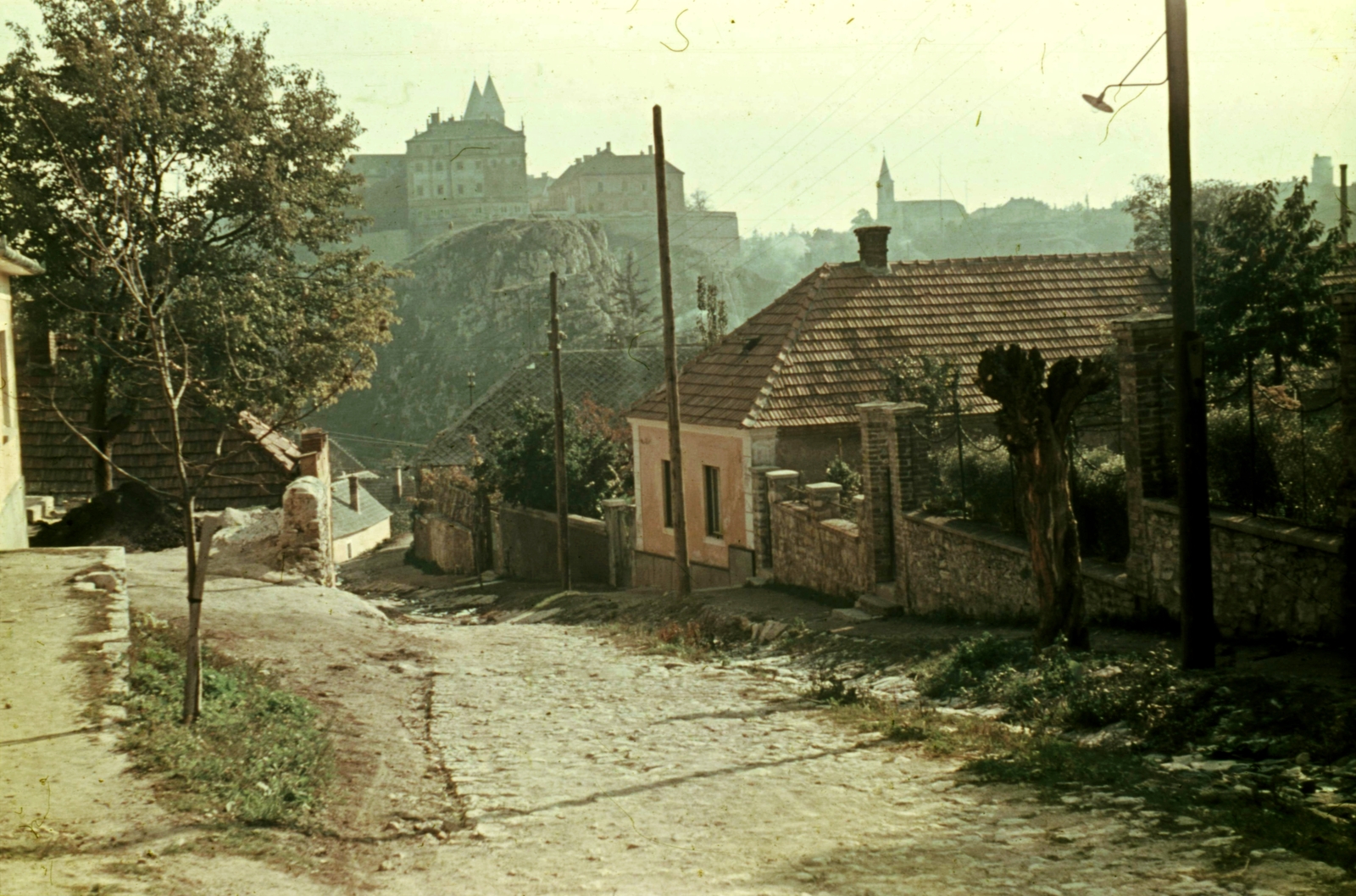 Hungary, Veszprém, Céhház utca a Benedek-hegy és vár felé nézve., 1966, Herth Viktória dr, Bodó Emma, colorful, street view, pylon, Fortepan #76486