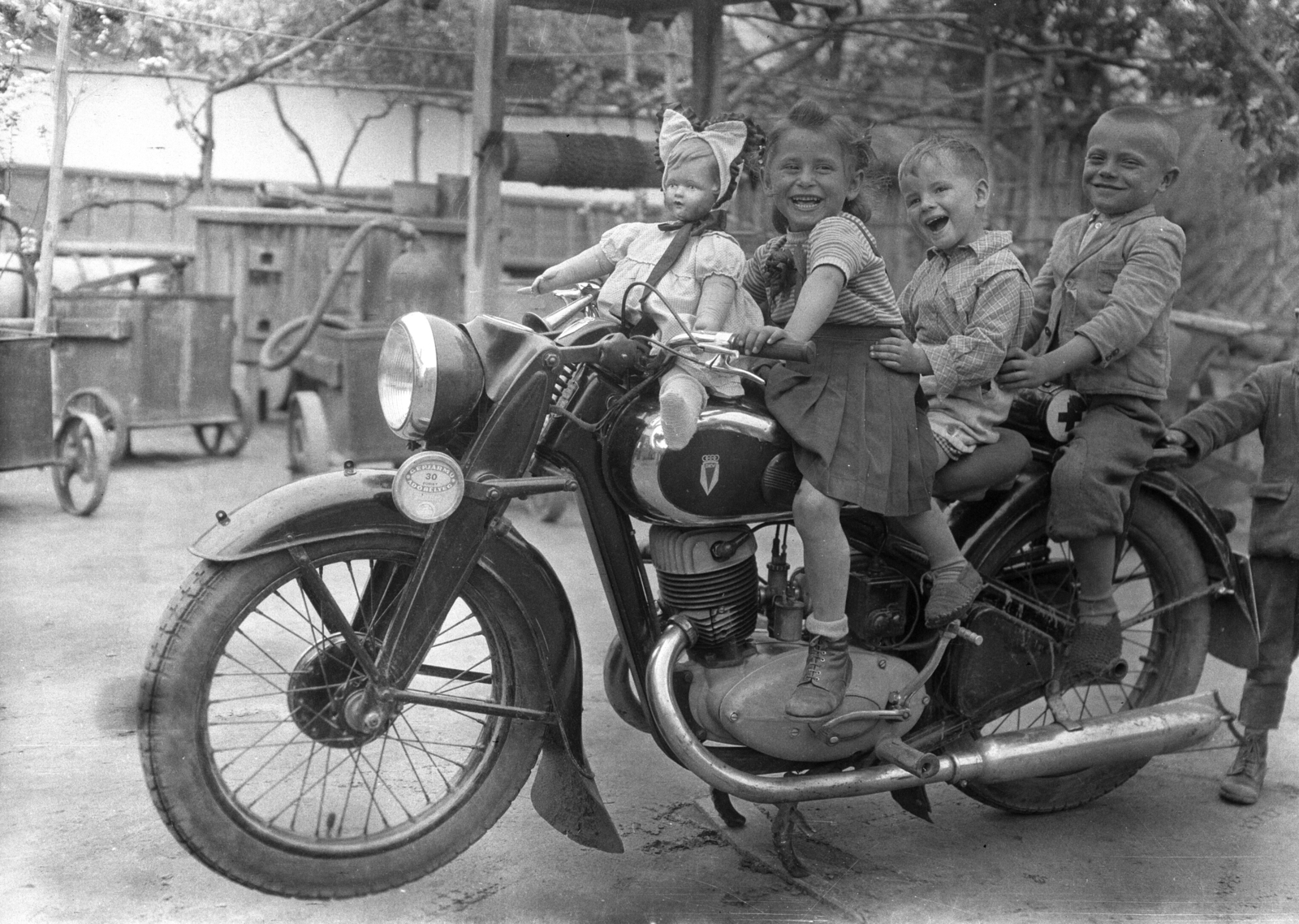 1947, Erky-Nagy Tibor, toy doll, motorcycle, smile, DKW-brand, kids, Fortepan #76750