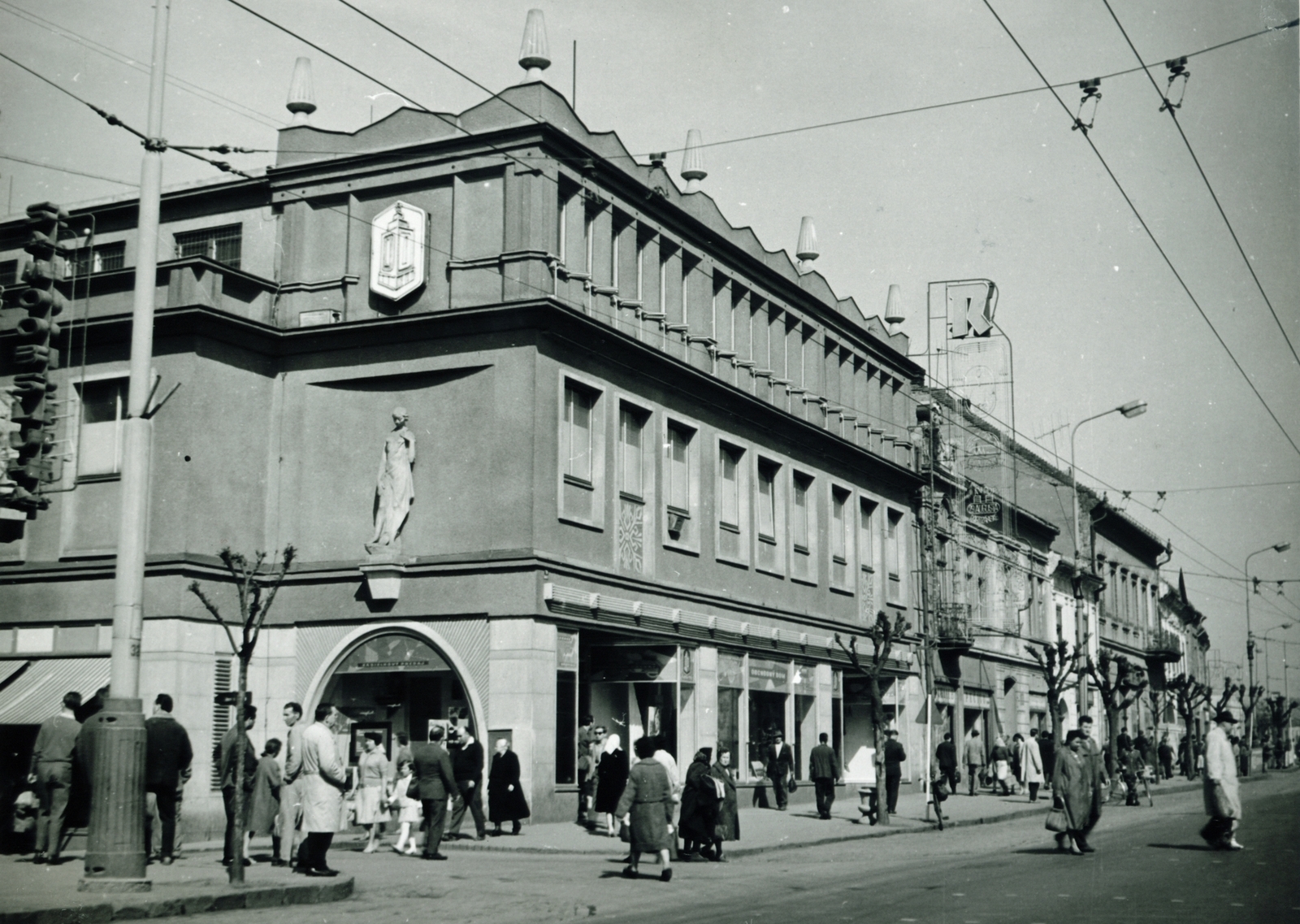 Slovakia, Prešov, Fő utca., 1964, Ördögh János, Czechoslovakia, sculpture, street view, neon sign, catenary wire, Fortepan #77561