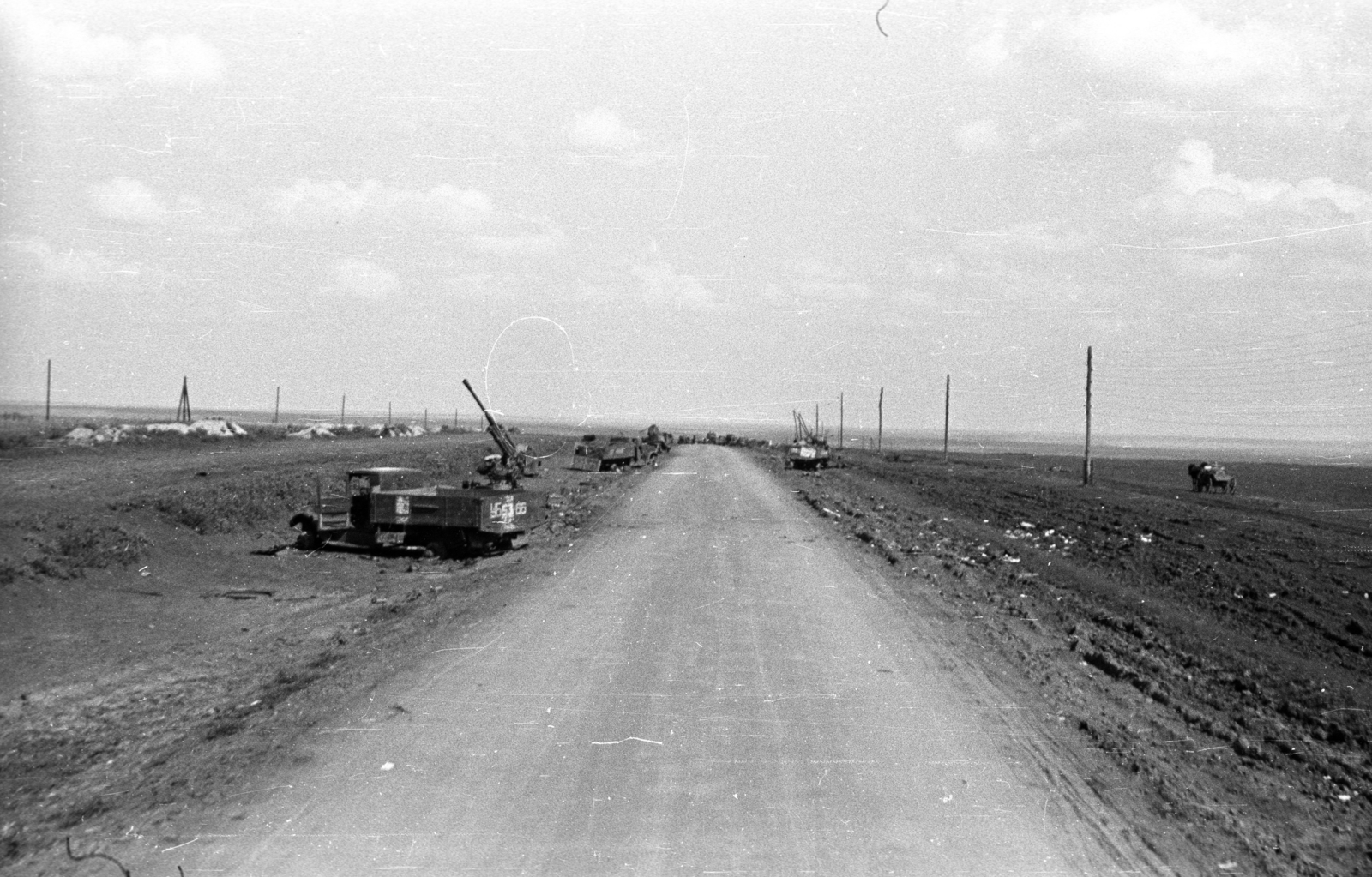 Ukraine, 1941, Berkó Pál, commercial vehicle, swastica, second World War, wreck, picture, weapon, ordnance, power line, eastern front, Fortepan #78344