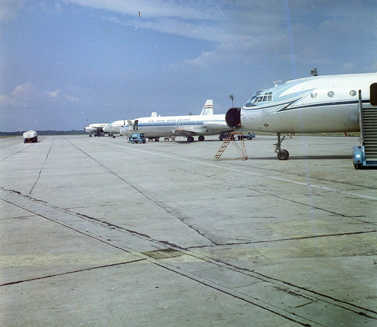 Hungary, Ferihegy (now - Ferenc Liszt) International Airport, Budapest XVIII., 1968, UVATERV, colorful, airplane, airport, Ilyushin-brand, Hungarian Airlines, KLM Royal Dutch Airlines, McDonnell Douglas-brand, Budapest, aircraft steps, Fortepan #94737