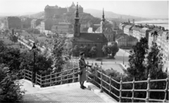 Hungary, Budapest I., látkép a Szent Gellért lépcsőről a Tabán és Királyi Palota (később Budavári Palota) felé. Előtérben a Szent Demeter szerb templom, mögötte az Alexandriai Szent Katalin-templom., 1943, Archiv für Zeitgeschichte ETH Zürich / Agnes Hirschi, Carl Lutz, church, Baroque-style, Budapest, bird's eye view, Serbian Orthodox Church, steeple, Fortepan #105742