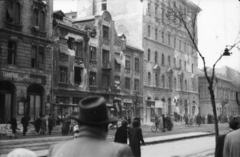 Magyarország, Budapest IX., Üllői út páratlan oldala. Baloldalt a Medikus eszpresszó, jobbra a Thaly Kálmán utca torkolata., 1956, Faragó György, forradalom, Budapest, Fortepan #128737