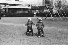 Hungary, Budapest XVIII., játszótér és benzinkút a Lakatos úti lakótelepen, háttérben a Lakatos út - Egressy Gábor utca sarkán álló toronyház., 1975, Chuckyeager tumblr, Budapest, tricycle, playground, Fortepan #134076