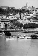 Magyarország, Budapest I., kilátás a Dunára a pesti oldalról a Széchenyi Lánchíd és a Mátyás-templom felé., 1934, Friss Ildikó, hajó, gőzhajó, lapátkerekes hajó, Kossuth/Leányfalu/Rigó/Ferenc Ferdinánd Főherceg hajó, Budapest, Fortepan #134540