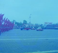 Hungary, Budapest XIV., Ötvenhatosok tere (Felvonulási tér), május 1-i felvonulás., 1985, MHSZ, colorful, flag, Czechoslovak brand, Soviet brand, Skoda-brand, ZIL-brand, Dacia-brand, march, 1st of May parade, Romanian make, Budapest, ad truck, Fortepan #15258