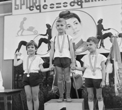 Hungary, Budapest II., Marczibányi tér, Vasas Turbó sporttelep., 1968, MHSZ, free time, kid, Budapest, winners' podium, medals, hold hands, Fortepan #15333