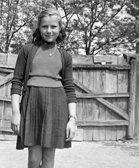 1958, Kurutz Márton, portrait, wrist watch, girl, pleated skirt, garden-gate, sweater, skirt, Fortepan #16342